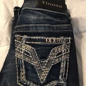 Never worn Vigoss.Distressed bootcut. Size 0 33L
